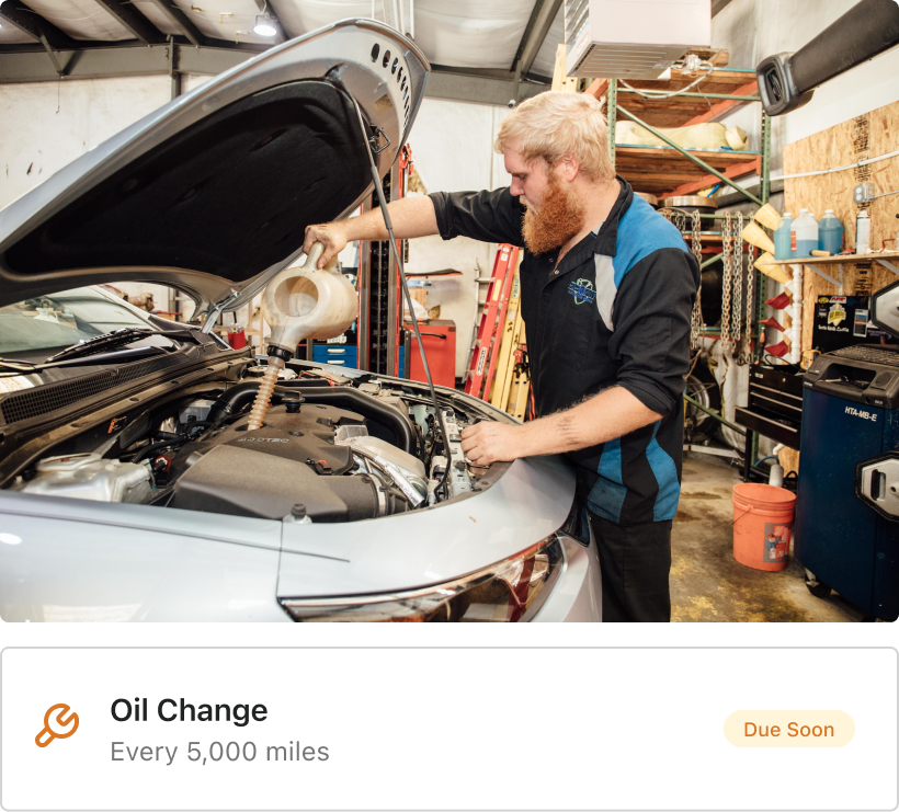 Fleet technician performs routine maintenance with help of Fleetio's maintenance schedules
