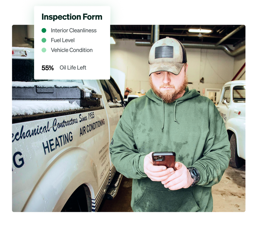 A fleet technician for an HVAC company using Fleetio Go to complete a tire inspection on a truck.