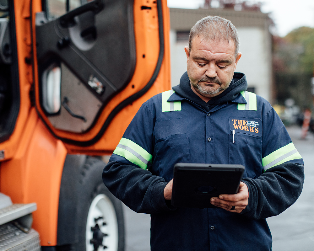 Driver performing a pre-trip inspection