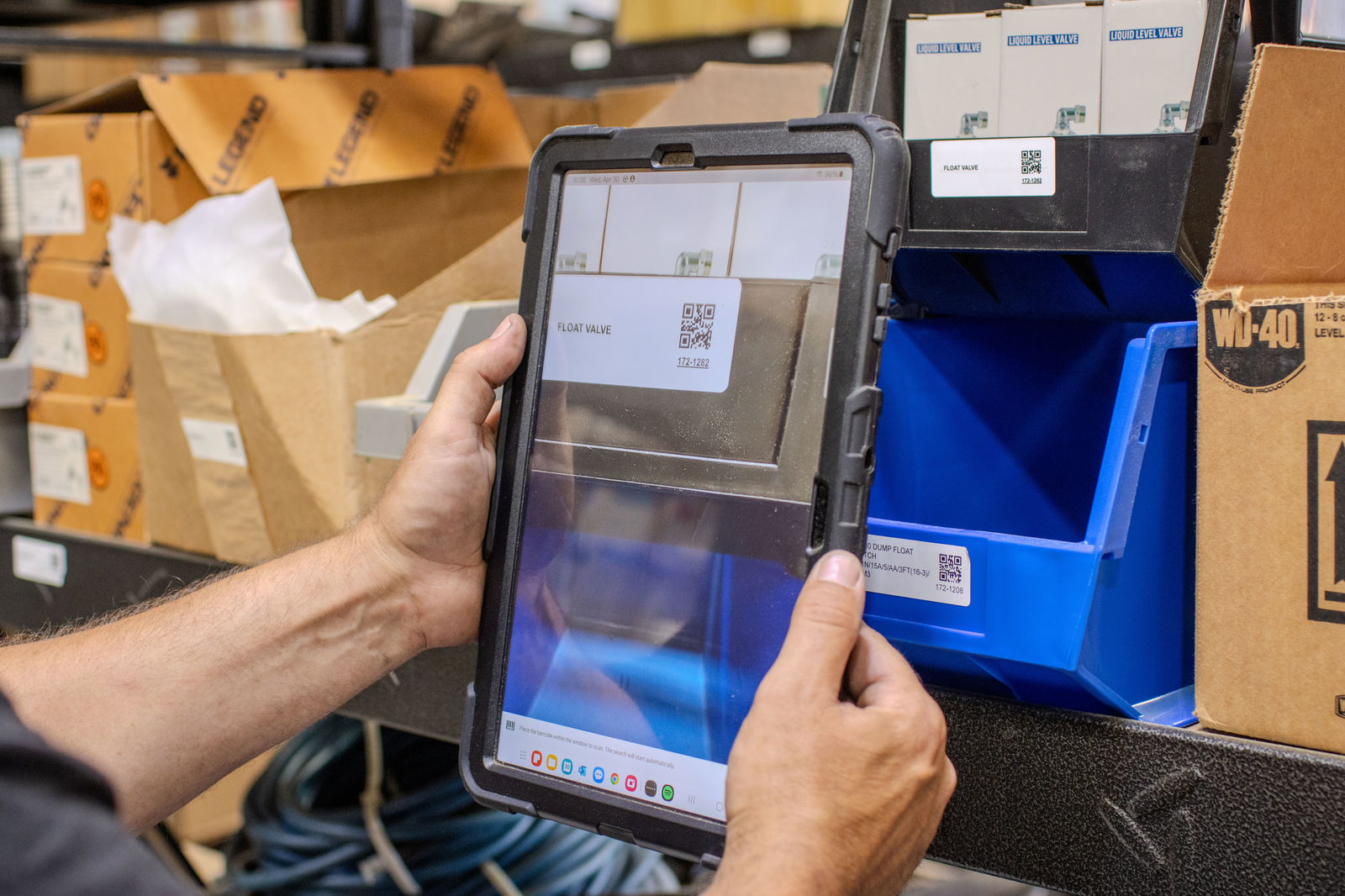 Employee scanning parts in Fleetio